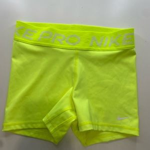 Neon yellow Nike spandex shorts